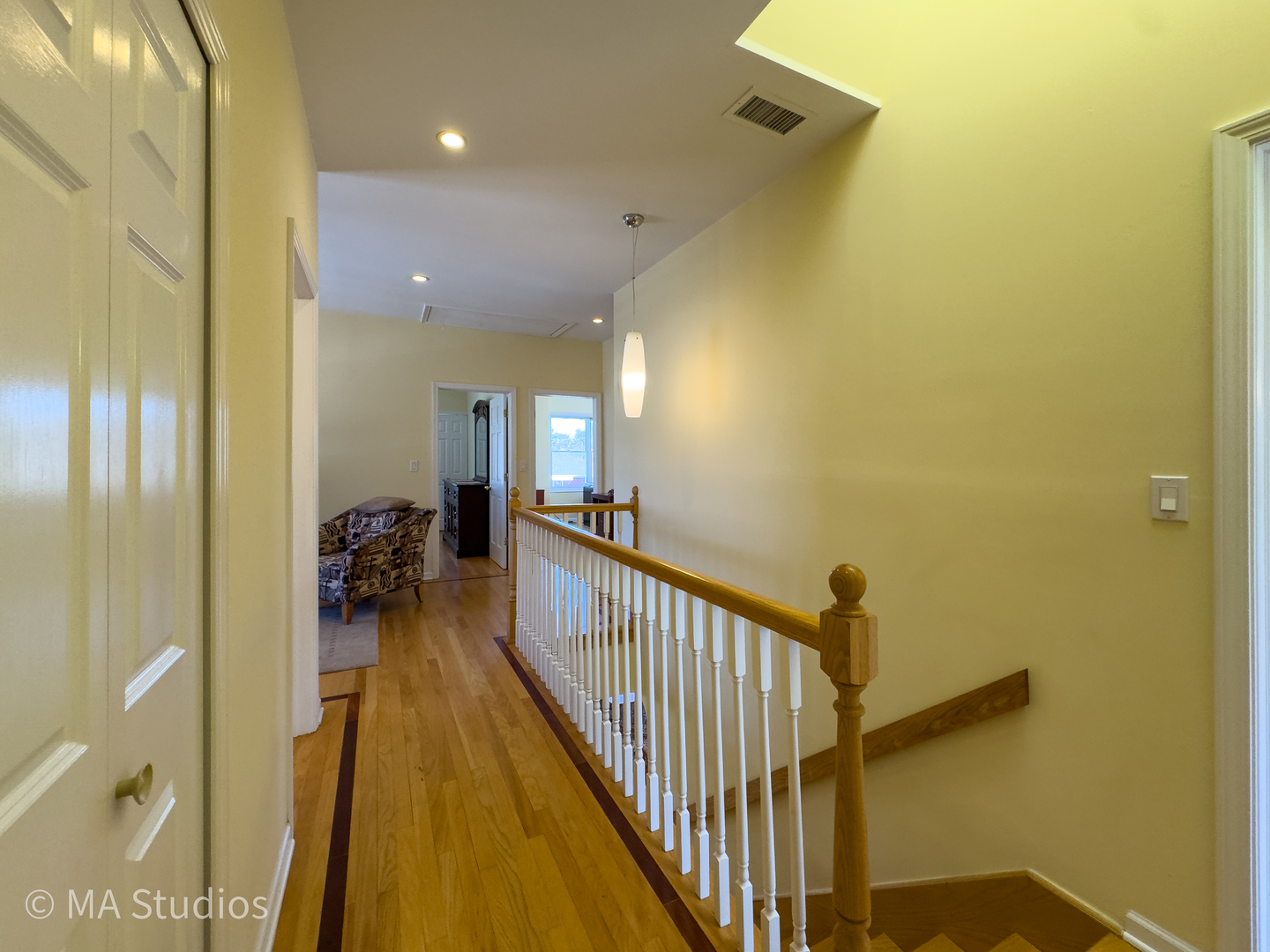 8912 Harms Road Morton Grove, IL 60053 - Photo 35 of 85 a view of a hallway with a couch