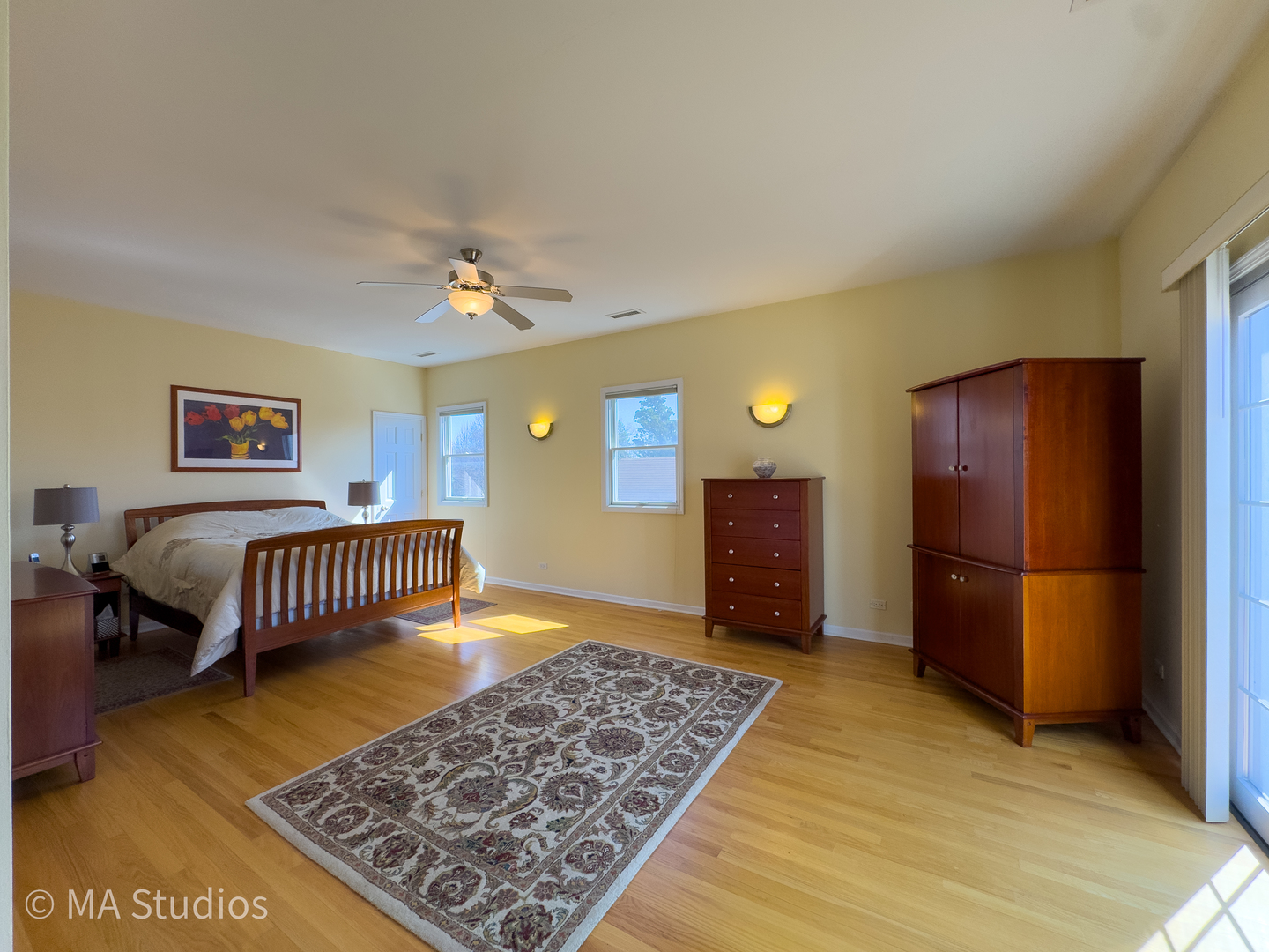 8912 Harms Road Morton Grove, IL 60053 - Photo 37 of 85 a bedroom with a bed and a dresser