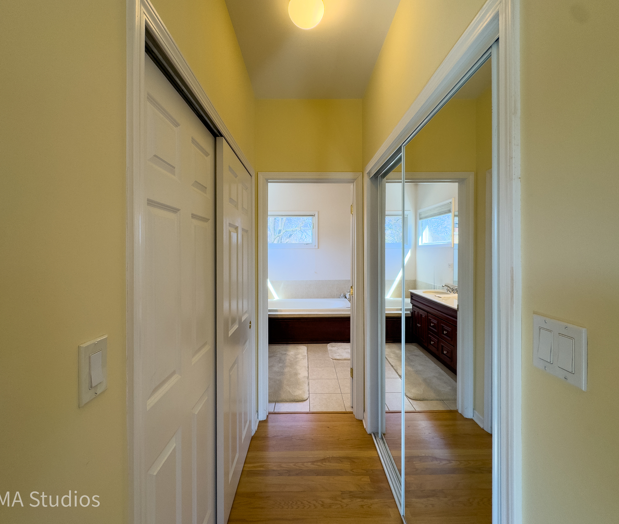 8912 Harms Road Morton Grove, IL 60053 - Photo 41 of 85 a view of a hallway with a livingroom and furniture