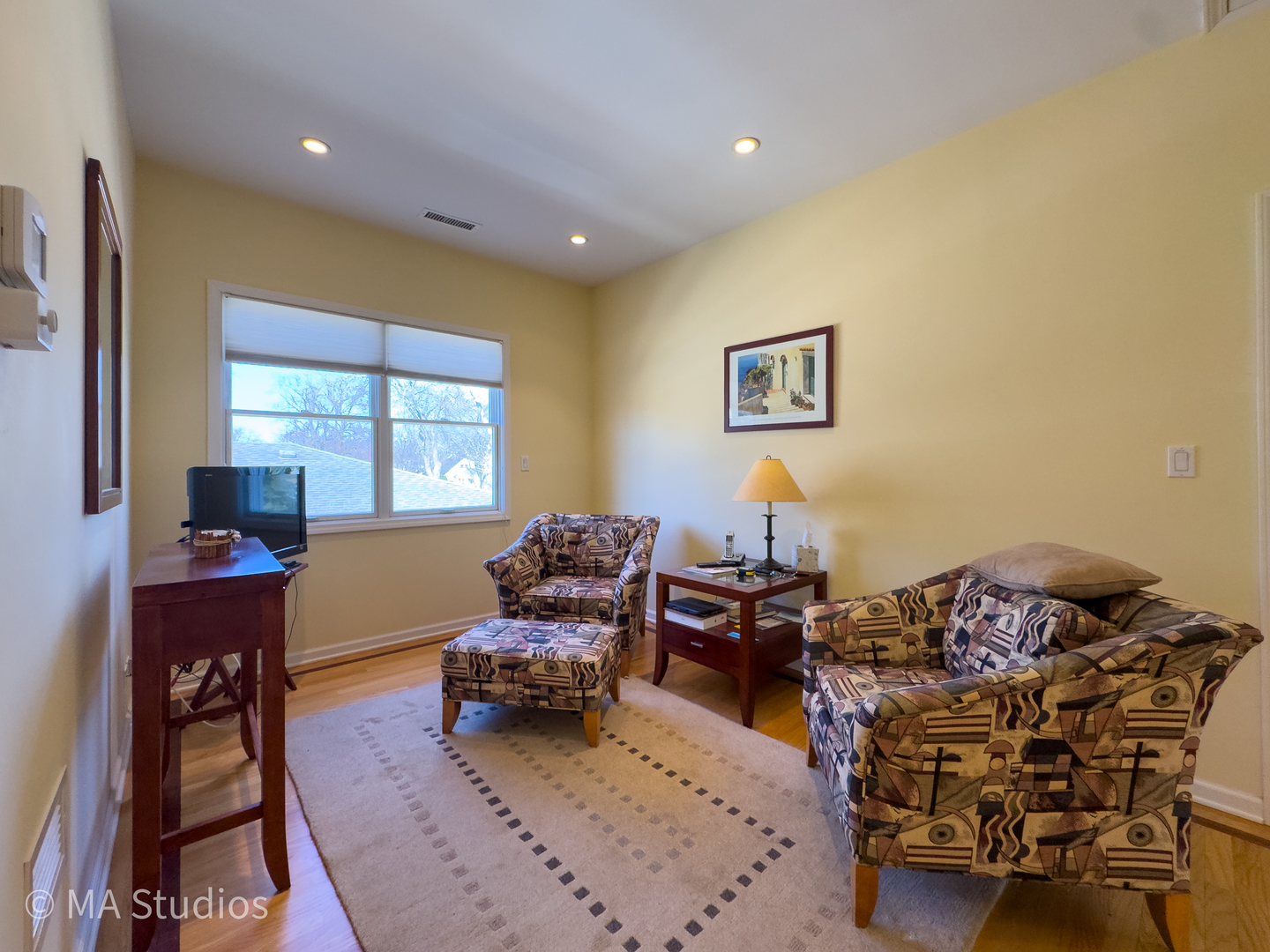 8912 Harms Road Morton Grove, IL 60053 - Photo 49 of 85 a living room with furniture and a window