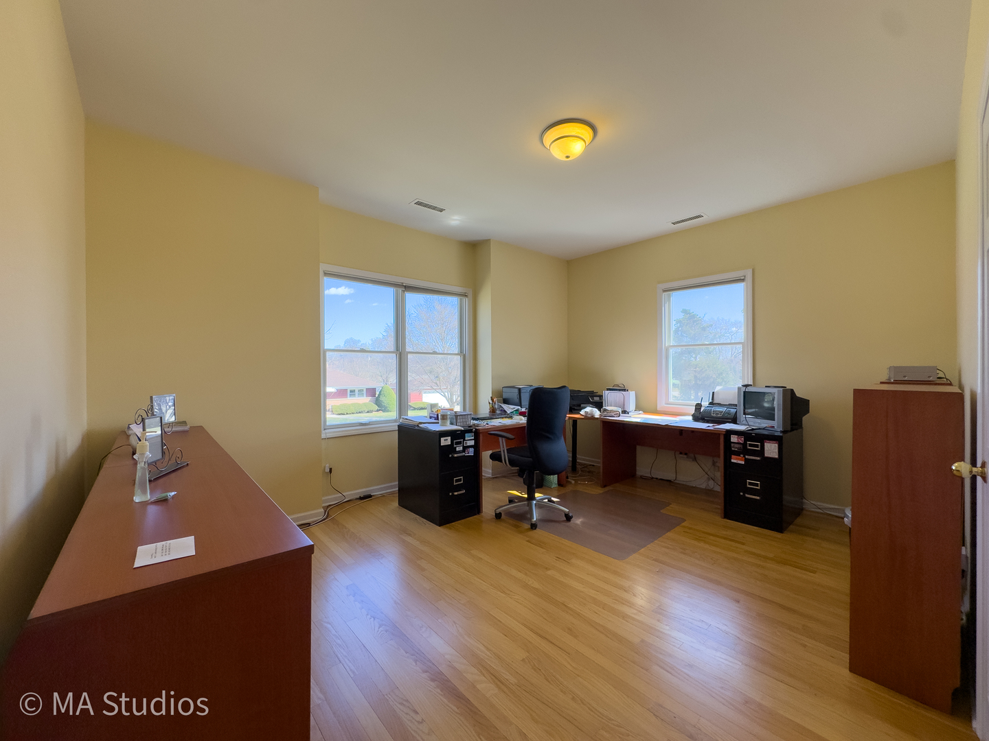 8912 Harms Road Morton Grove, IL 60053 - Photo 56 of 85 a view of a workspace with furniture and a window
