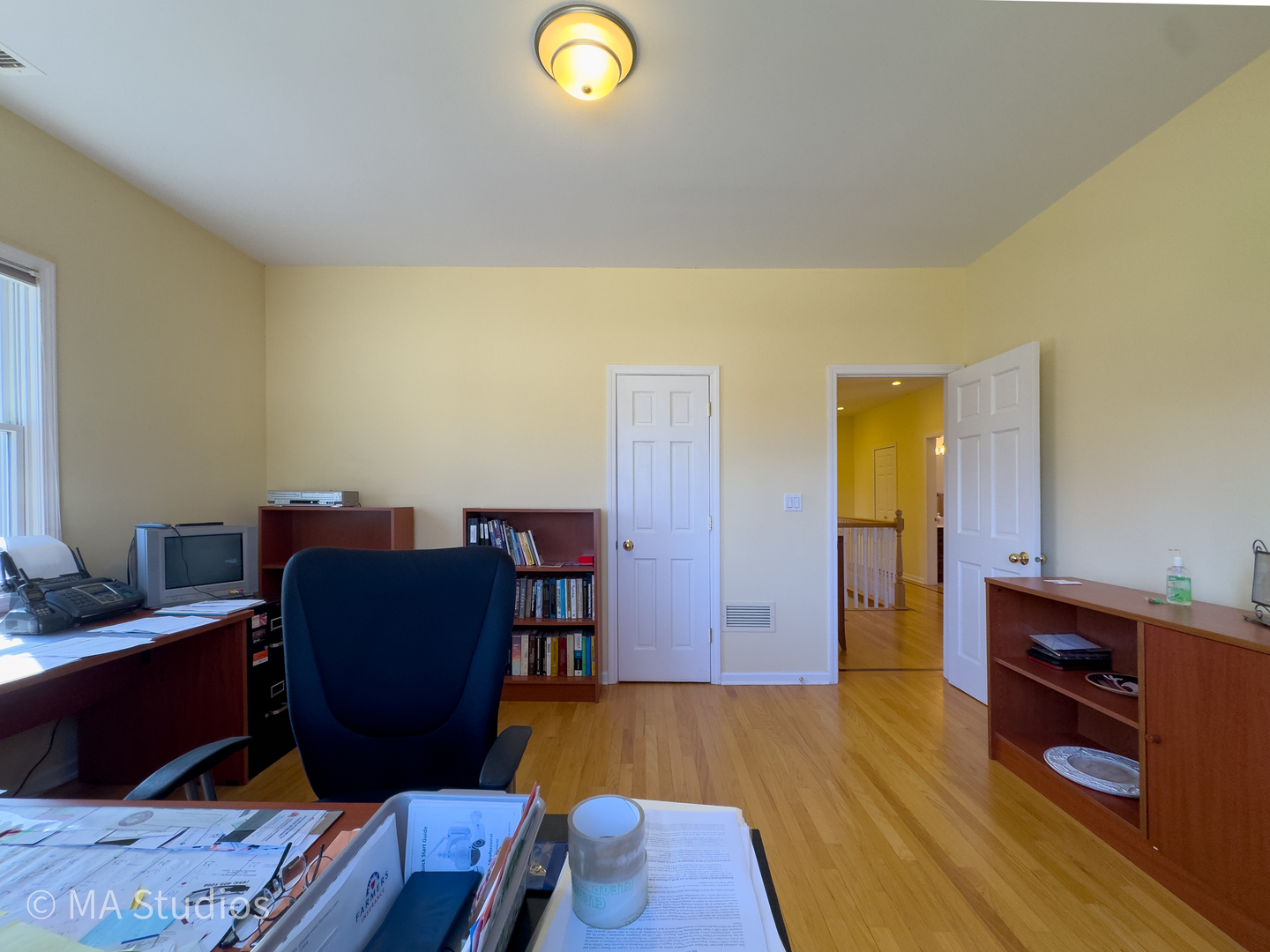 8912 Harms Road Morton Grove, IL 60053 - Photo 58 of 85 a view of a workspace with furniture and wooden floor