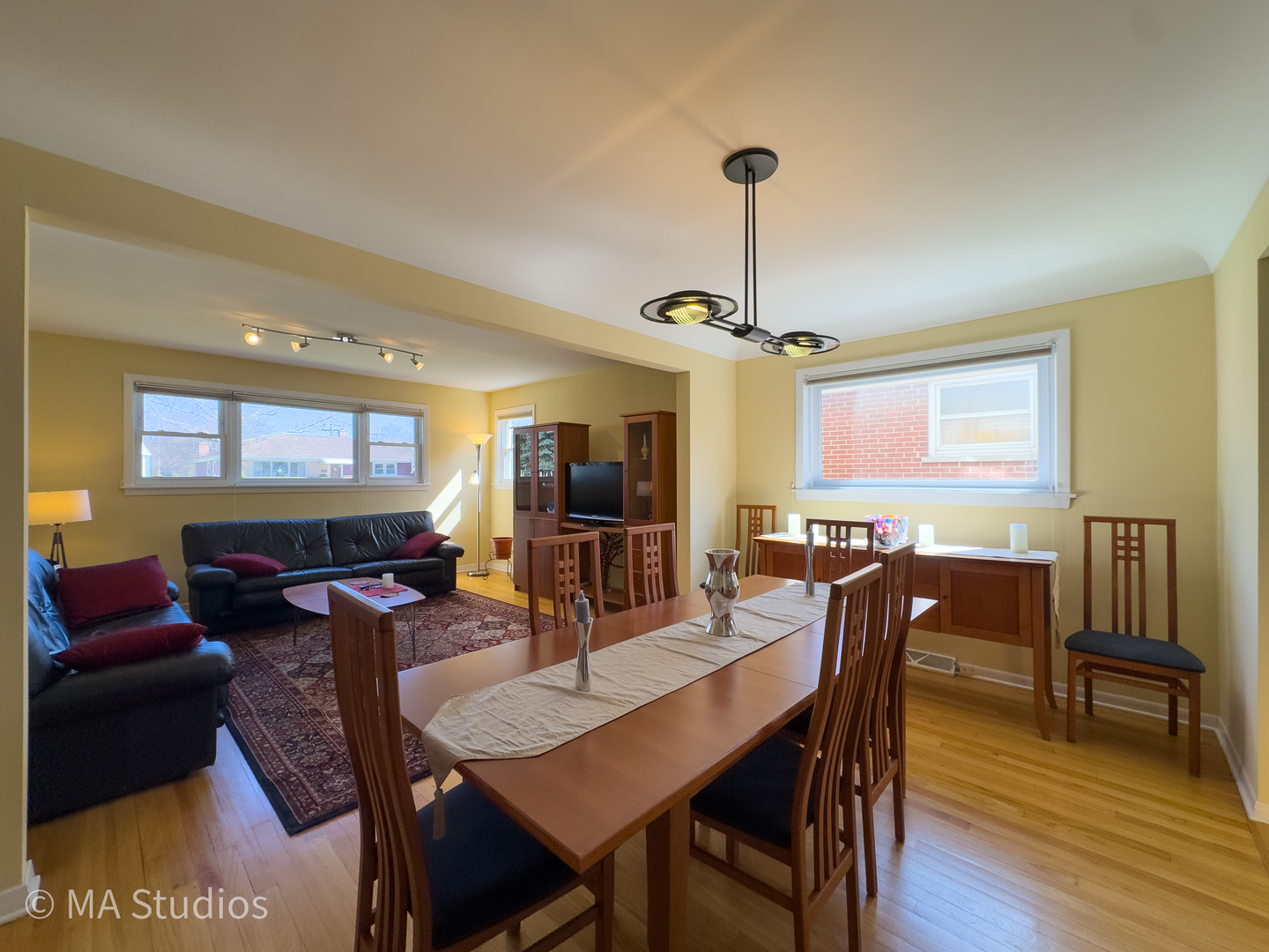 8912 Harms Road Morton Grove, IL 60053 - Photo 10 of 85 a view of a dining room with furniture