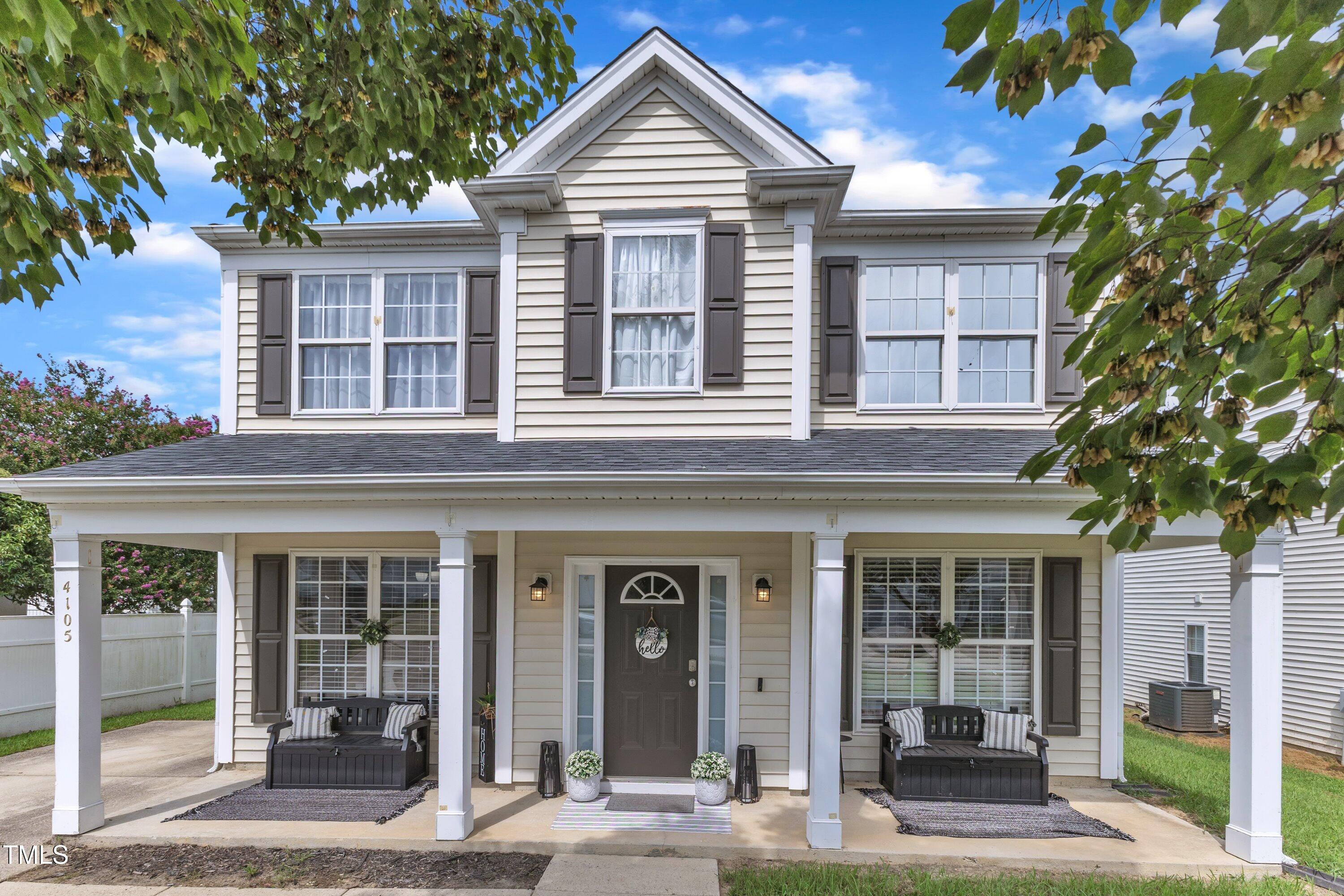 front view of a brick house with a large windows