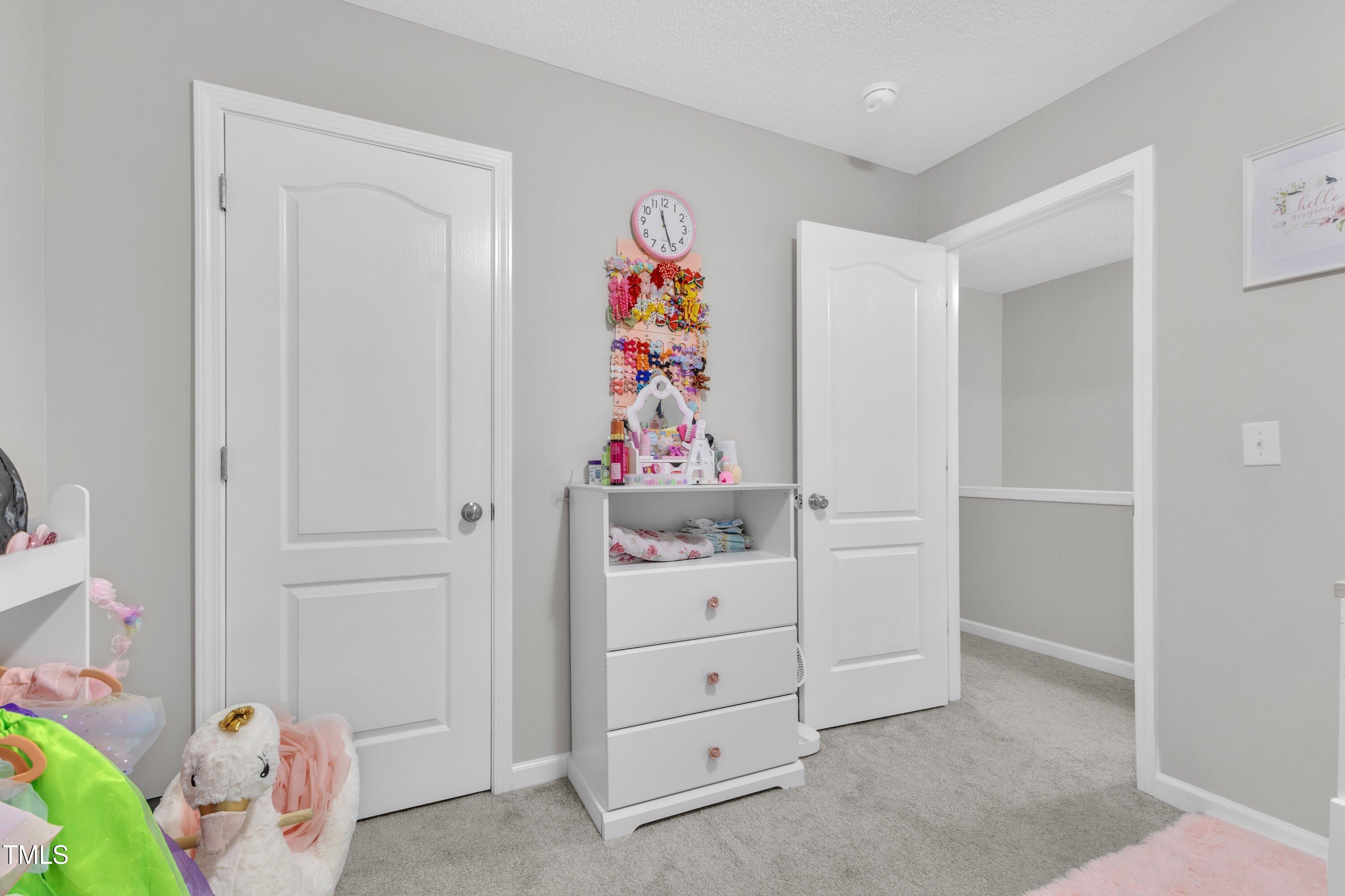 4105 Crowfield Drive Raleigh, NC 27610 - Photo 28 of 38 a view of an entryway with wooden floor
