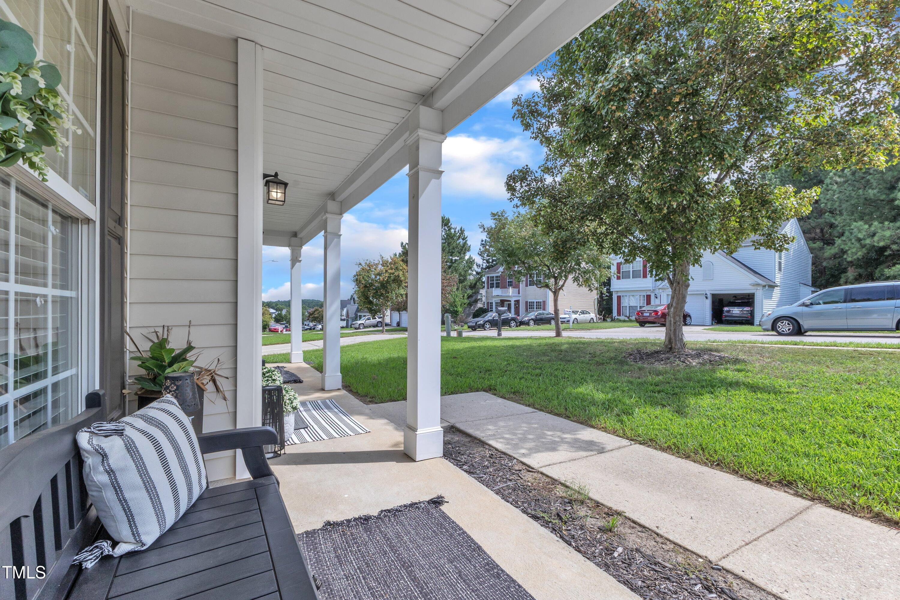 4105 Crowfield Drive Raleigh, NC 27610 - Photo 5 of 38 a view of a house with backyard and sitting area
