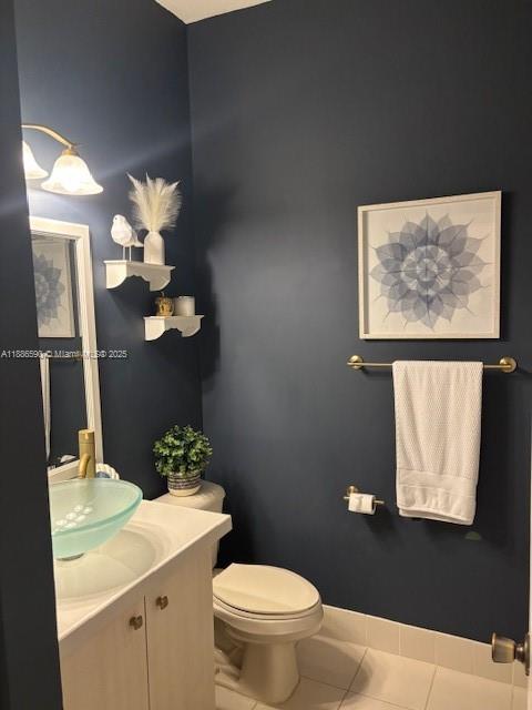 23731 Southwest 110th Avenue Homestead, FL 33032 - Photo 4 of 12 a bathroom with a toilet sink and mirror