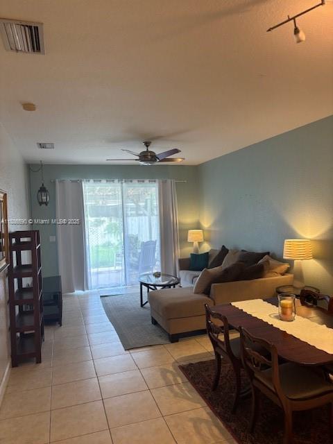 23731 Southwest 110th Avenue Homestead, FL 33032 - Photo 7 of 12 a living room with furniture and a large window