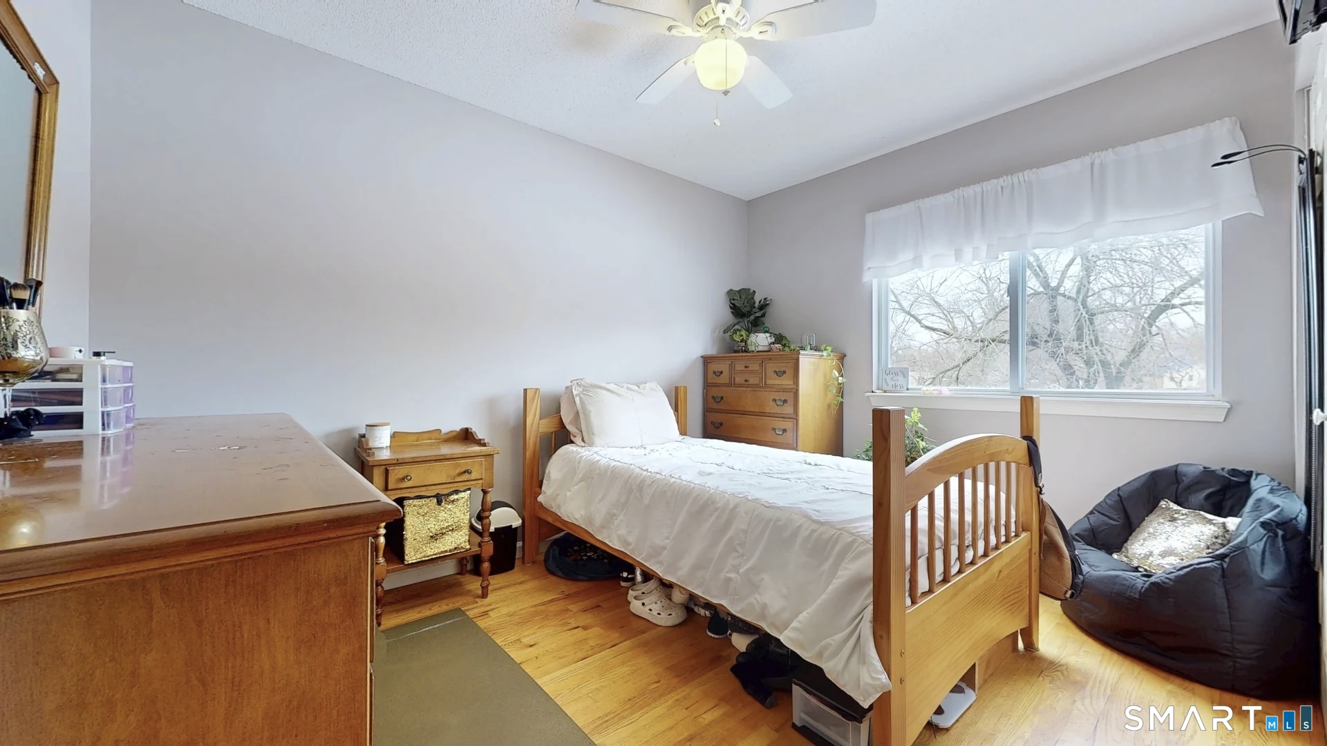 24 Mathew Street Milford, CT 06460 - Photo 13 of 20 a bedroom with a bed and a window