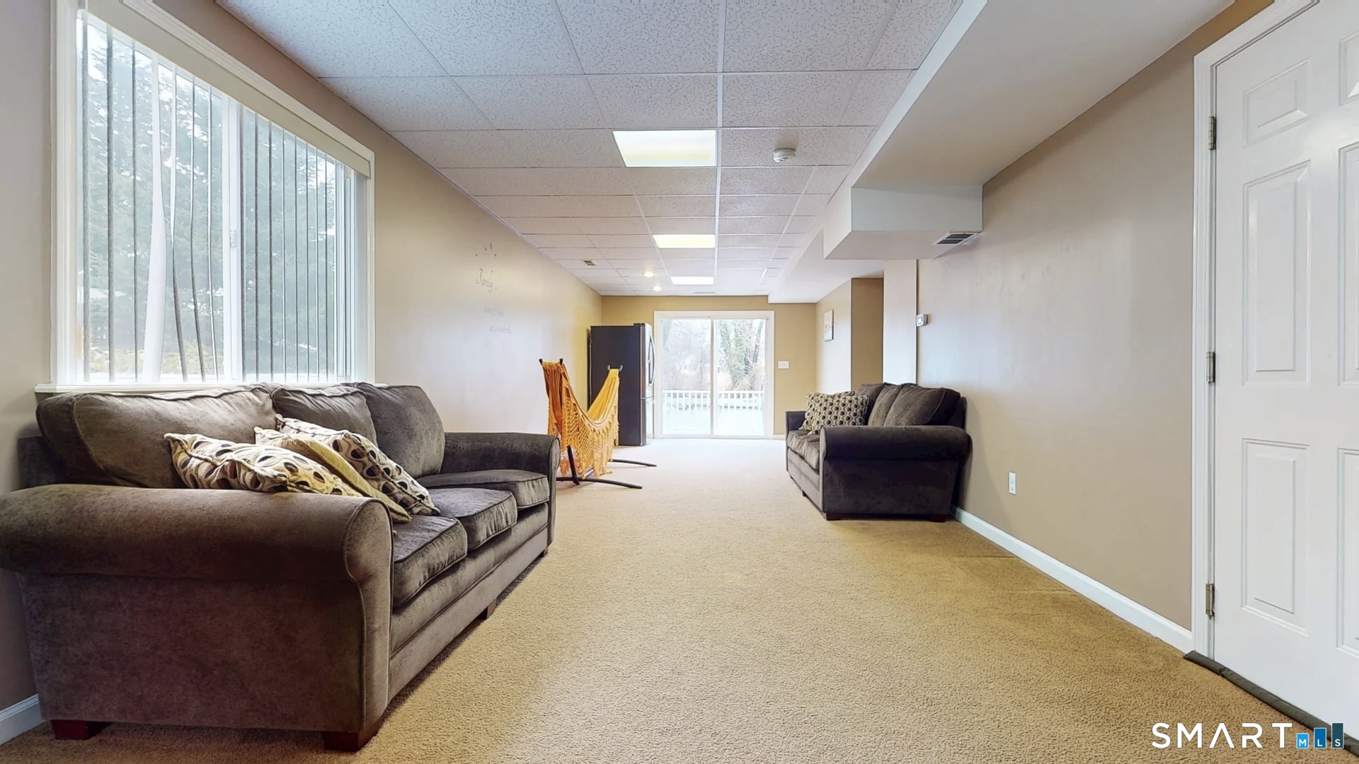 24 Mathew Street Milford, CT 06460 - Photo 15 of 20 a living room with furniture and a flat screen tv