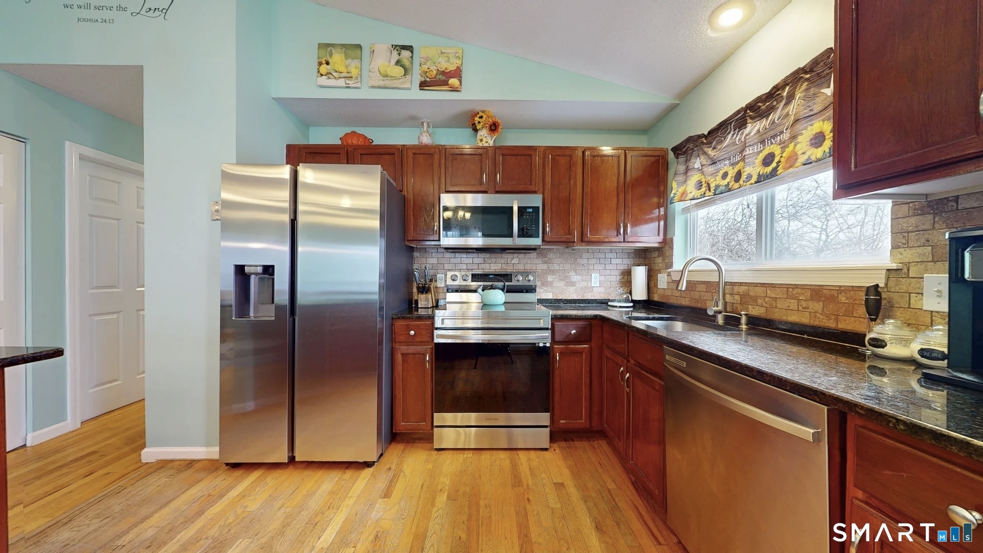 24 Mathew Street Milford, CT 06460 - Photo 3 of 20 a kitchen with stainless steel appliances granite countertop a refrigerator and a stove top oven
