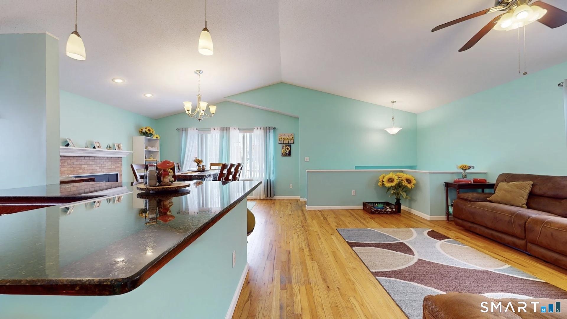 24 Mathew Street Milford, CT 06460 - Photo 4 of 20 a bed room with a bed window and a couch
