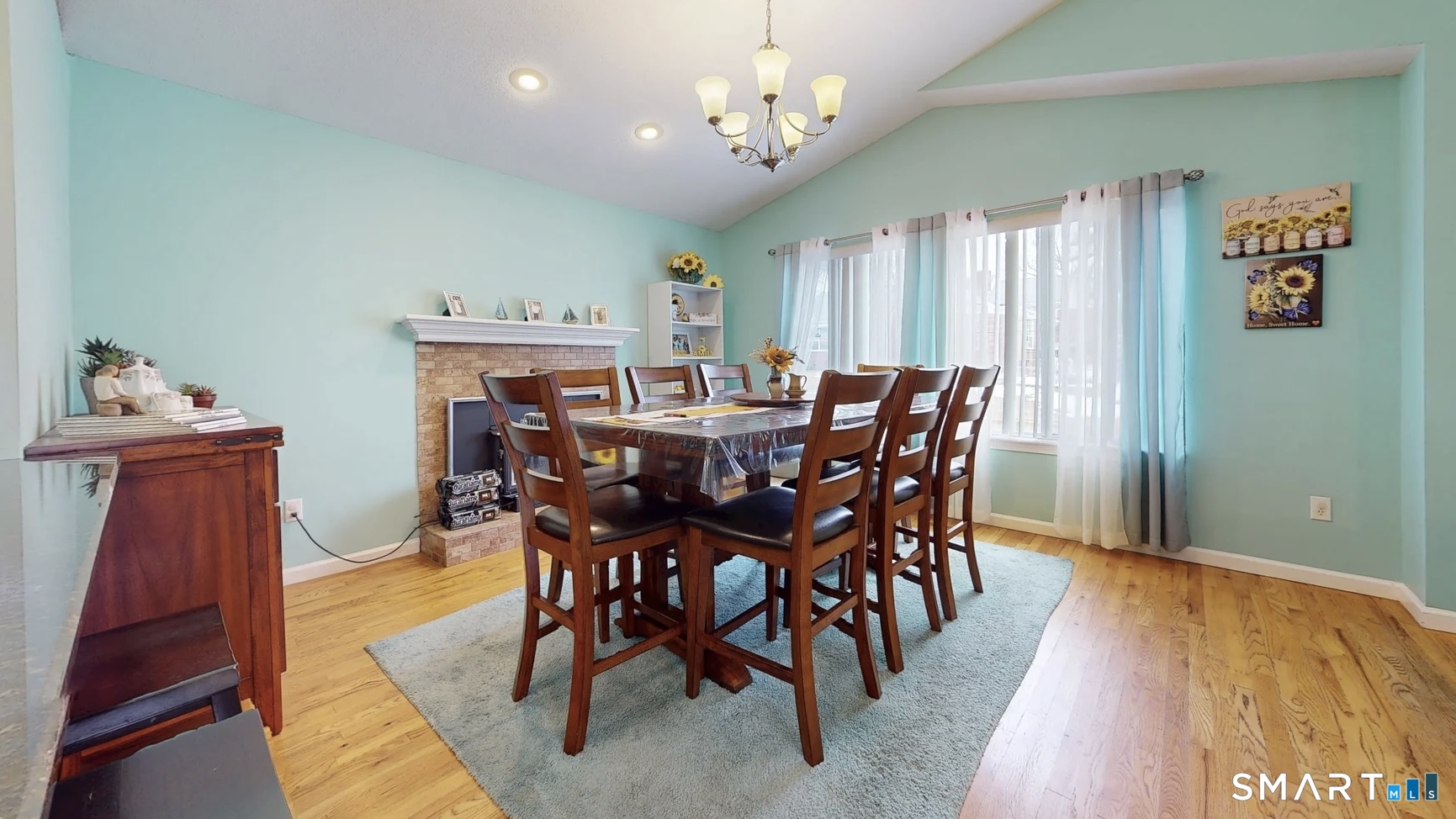 24 Mathew Street Milford, CT 06460 - Photo 7 of 20 a view of a dining room with furniture window and wooden floor