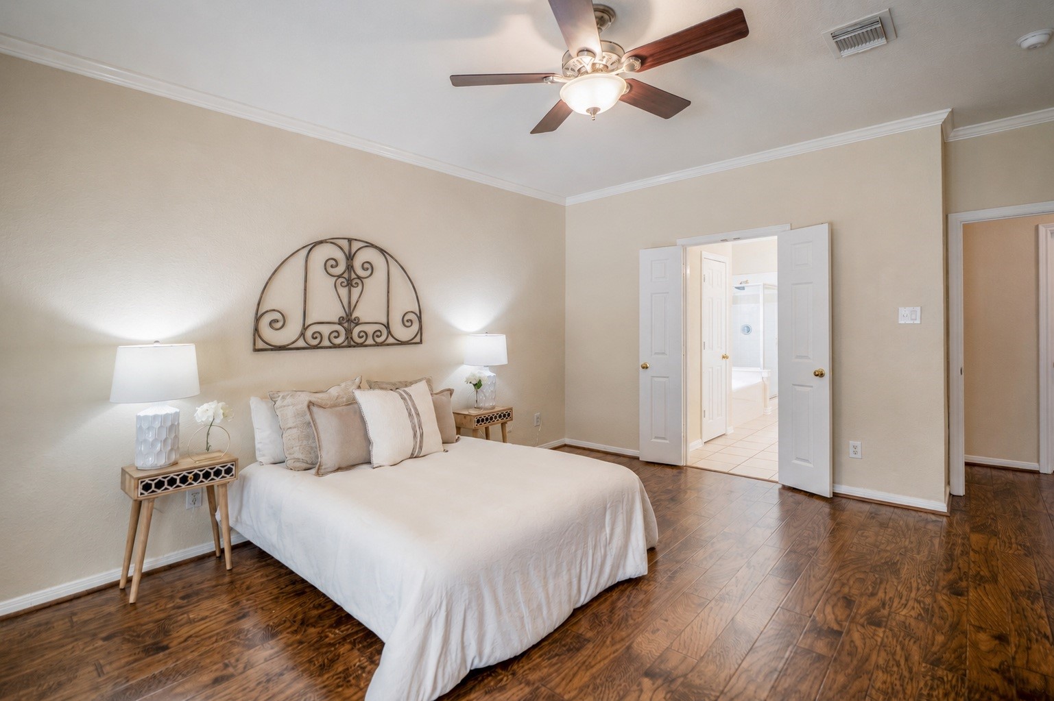 5807 Sequoia Trace Court Spring, TX 77379 - Photo 15 of 50 The downstairs primary suite offers a peaceful retreat and a seamless connection to the private ensuite bath and walk-in closet.