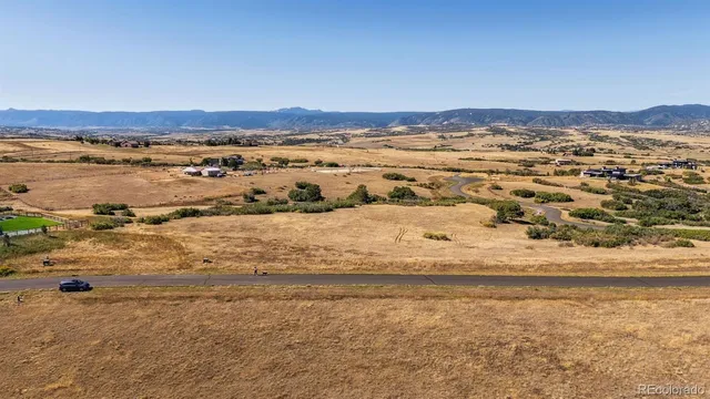 an aerial view of beach and ocean