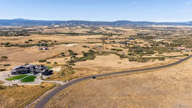 an aerial view of beach and ocean