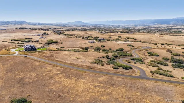 an aerial view of beach and ocean