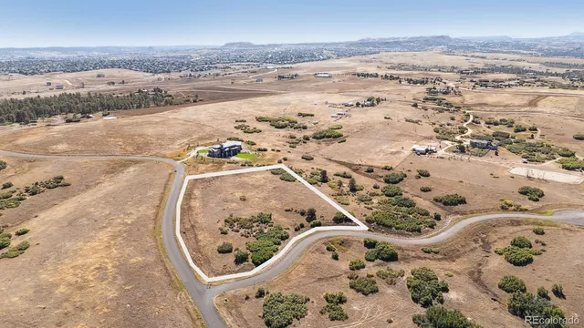 an aerial view of beach and ocean