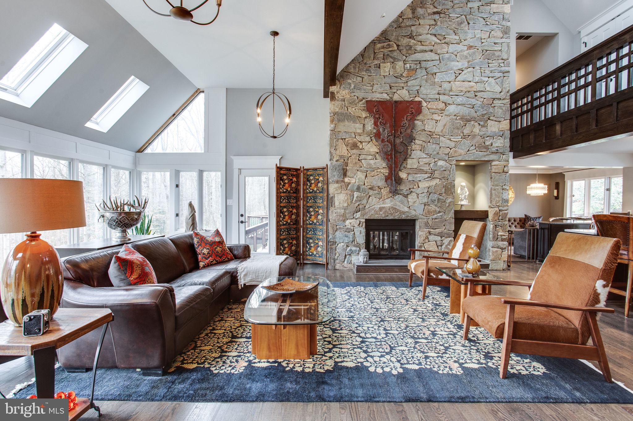 705 Clear Spring Road Great Falls, VA 22066 - Photo 19 of 62 Floor to ceiling stacked stone wood fireplace