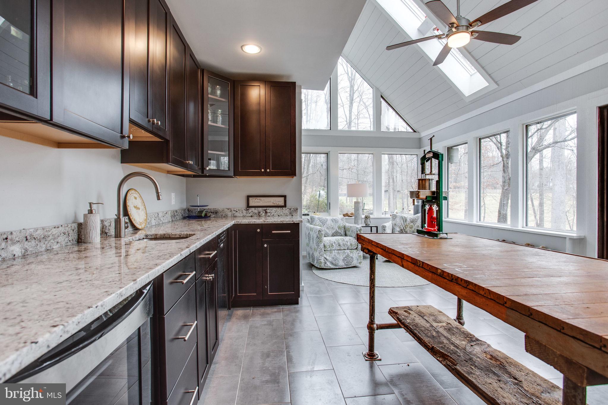 705 Clear Spring Road Great Falls, VA 22066 - Photo 26 of 62 Wet bar with beverage fridge and dishwasher