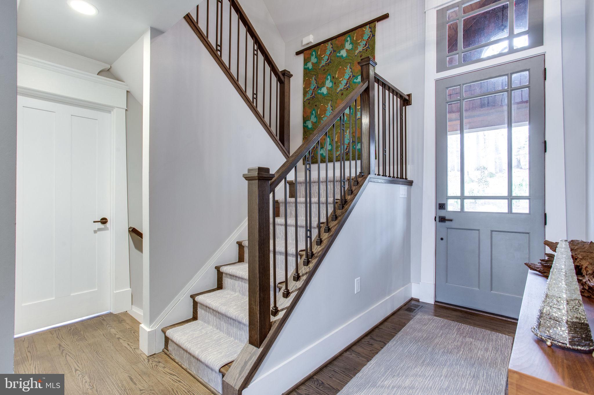 705 Clear Spring Road Great Falls, VA 22066 - Photo 5 of 62 Inviting foyer with one of two staircases