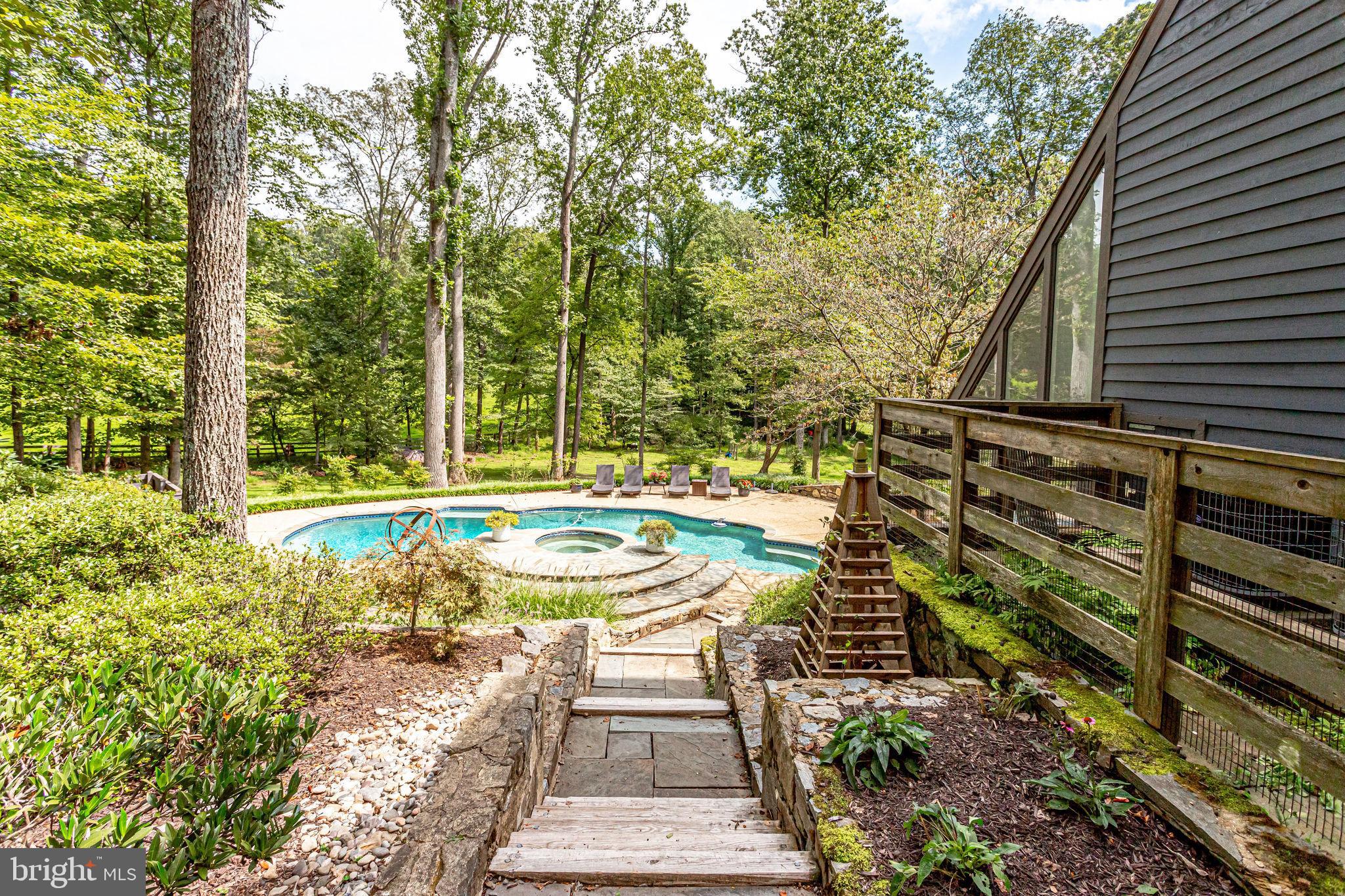 705 Clear Spring Road Great Falls, VA 22066 - Photo 47 of 62 Stair path from front yard to pool area