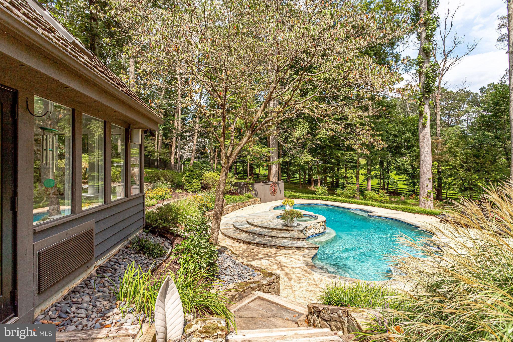 705 Clear Spring Road Great Falls, VA 22066 - Photo 52 of 62 Walkway from Sunroom/pool room