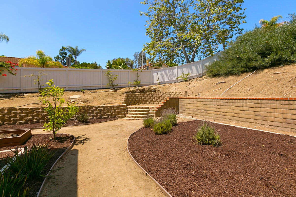 1811 Crystal Ridge Way Vista, CA 92081 - Photo 14 of 14 raised area perfect for a summer/winter firepit!