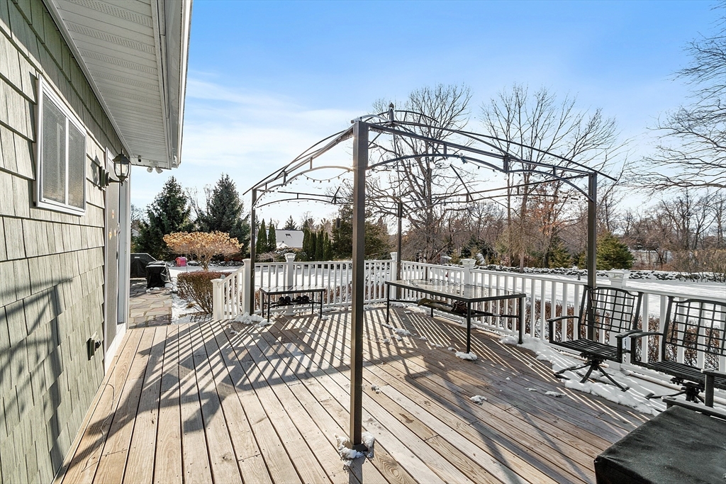 5 Spaulding Hill Road Pelham, NH 03076 - Photo 8 of 40 a view of balcony with wooden floor and fence
