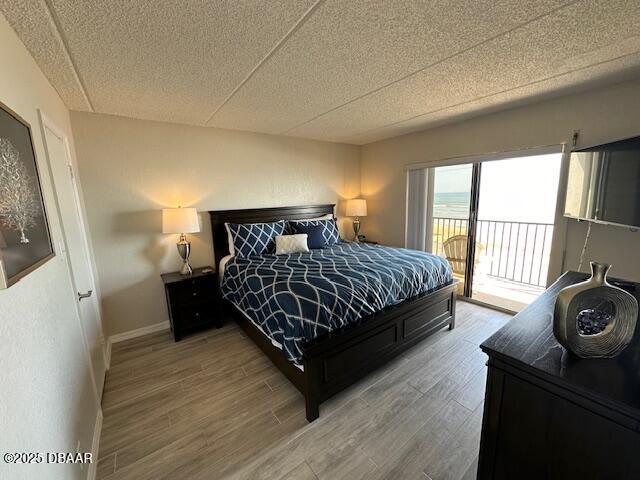 2700 Ocean Shore Boulevard, Unit 301 Ormond Beach, FL 32176 - Photo 18 of 42 a bedroom with a bed and a window