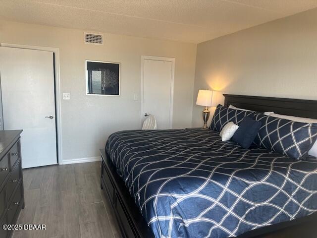 2700 Ocean Shore Boulevard, Unit 301 Ormond Beach, FL 32176 - Photo 23 of 42 a bedroom with a bed and a window