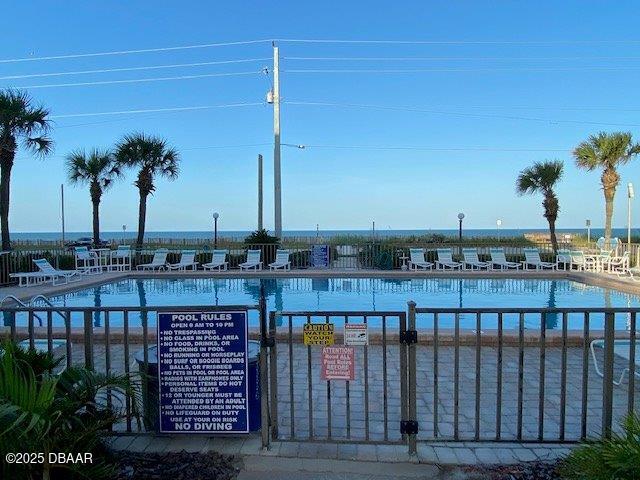 2700 Ocean Shore Boulevard, Unit 301 Ormond Beach, FL 32176 - Photo 33 of 42 a view of a balcony with wooden floor and outdoor space