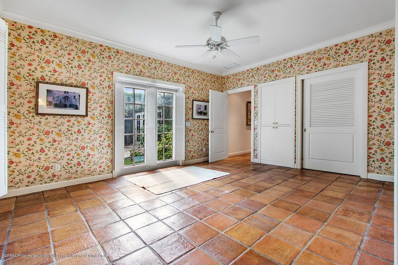 255 Ridgeview Drive Palm Beach, FL 33480 - Photo 9 of 20 a view of an empty room with wooden floor
