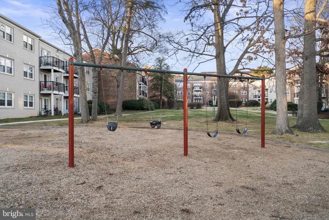 a view of a electric car park in front of a building