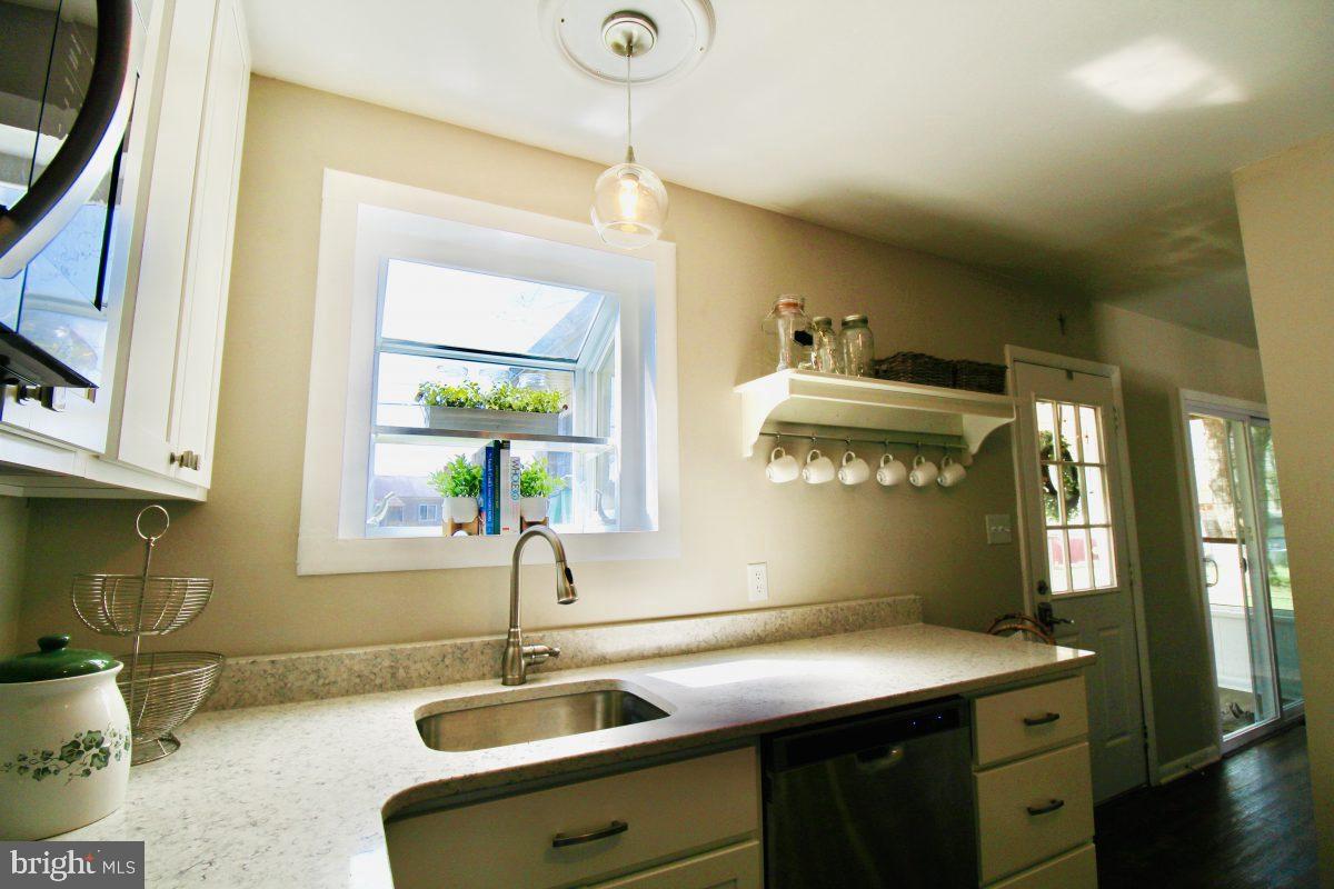 388 Nimitz Road Dover, DE 19901 - Photo 11 of 25 a kitchen with a sink and a window