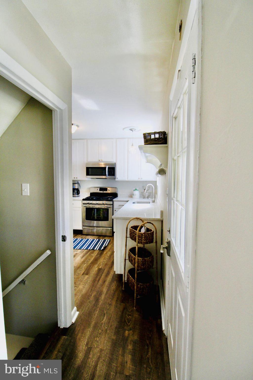 388 Nimitz Road Dover, DE 19901 - Photo 13 of 25 a view of a kitchen from the hallway