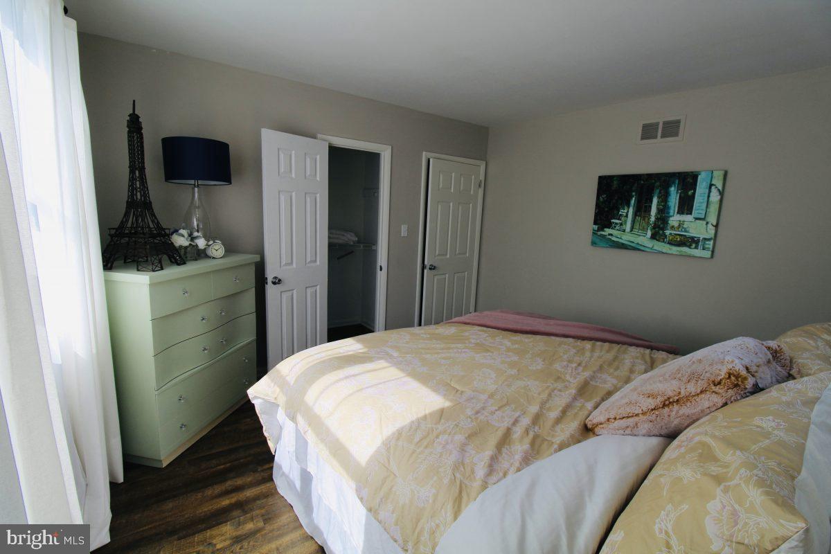 388 Nimitz Road Dover, DE 19901 - Photo 20 of 25 a bedroom with a bed and a closet