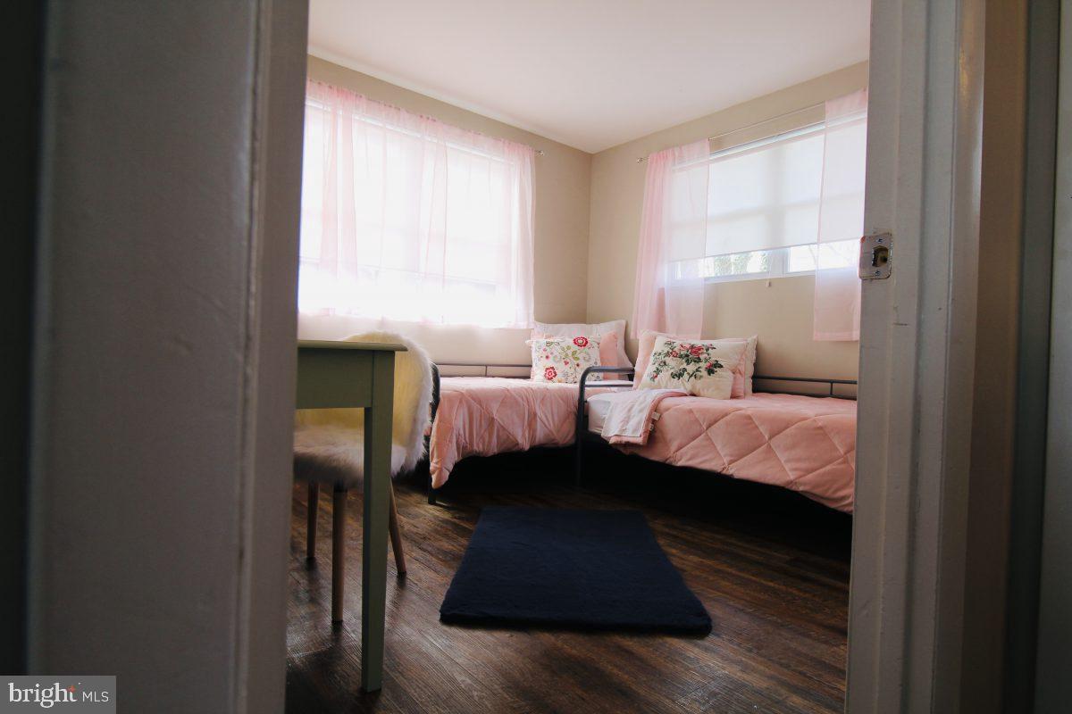 388 Nimitz Road Dover, DE 19901 - Photo 23 of 25 a bed room with a bed and a window