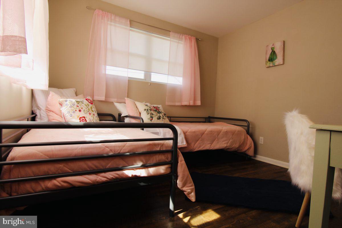388 Nimitz Road Dover, DE 19901 - Photo 24 of 25 a bedroom with a bed and window