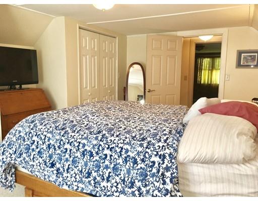 14 Ashuelot Road Northfield, MA 01360 - Photo 12 of 19 a bedroom with a bed and a flat screen tv