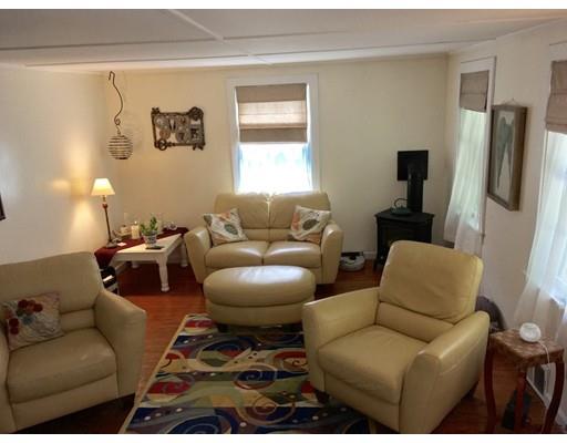 14 Ashuelot Road Northfield, MA 01360 - Photo 4 of 19 a living room with furniture a window and a flat screen tv