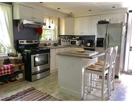 14 Ashuelot Road Northfield, MA 01360 - Photo 6 of 19 a kitchen with kitchen island granite countertop a stove a sink and a refrigerator