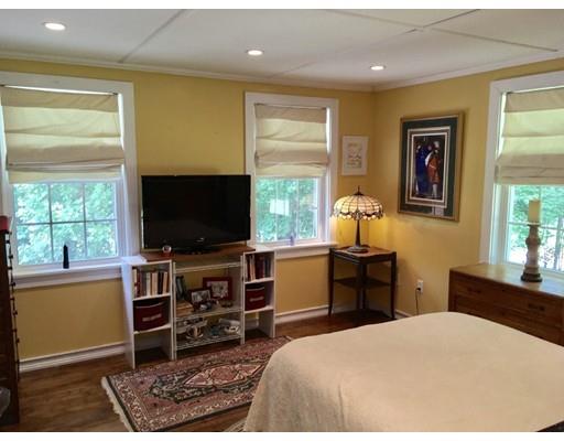 14 Ashuelot Road Northfield, MA 01360 - Photo 8 of 19 a bedroom with a bed and a flat screen tv
