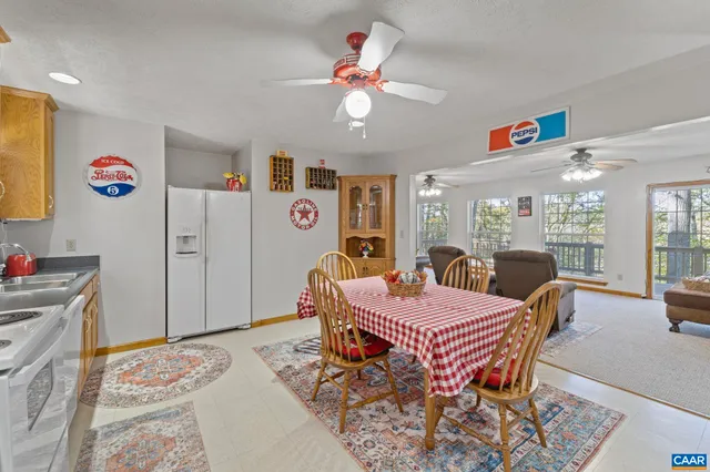 a view of a bedroom with wooden floor
