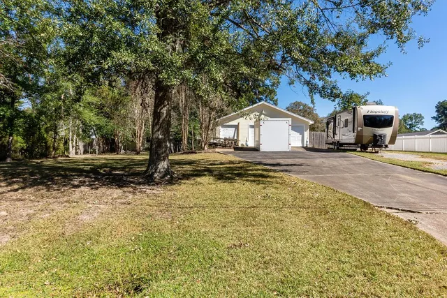 a view of a water fountain in front of a house