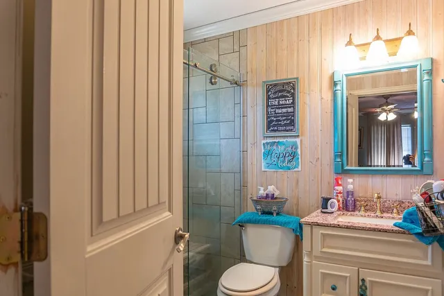 a bedroom with furniture and wooden floor