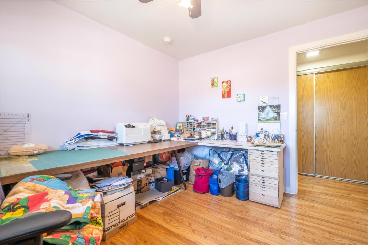 6195 Rockrose Drive Newark, CA 94560 - Photo 14 of 24 a view of dining room with wooden floor and chandelier