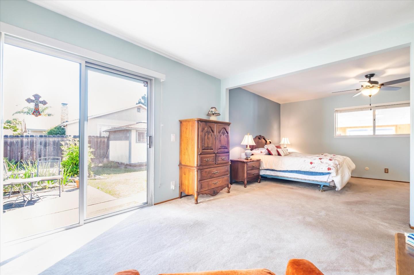 6195 Rockrose Drive Newark, CA 94560 - Photo 10 of 24 a bedroom with furniture and a large window