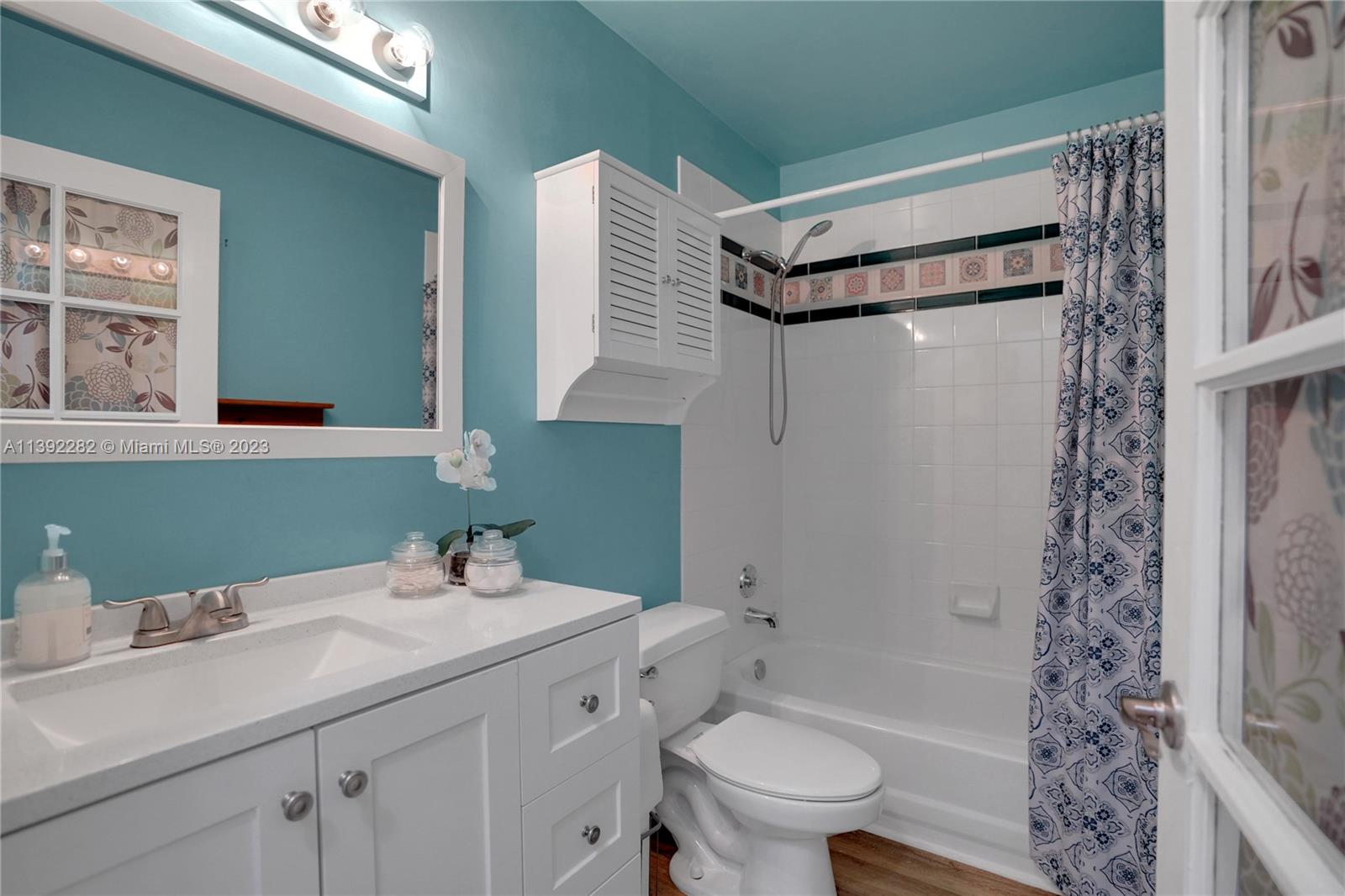 3850 Tree Top Road Cooper City, FL 33026 - Photo 28 of 34 a bathroom with a sink toilet and shower