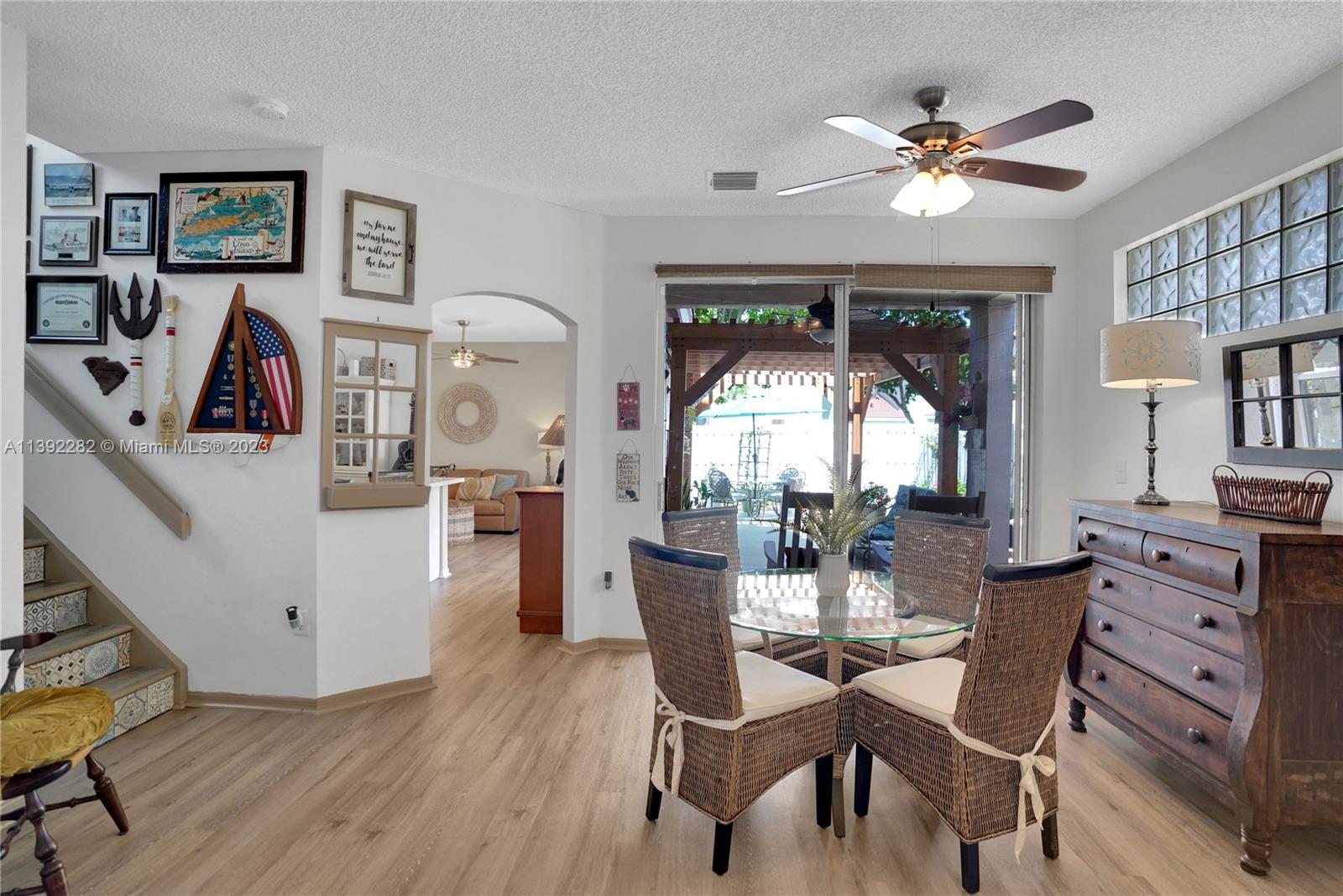 3850 Tree Top Road Cooper City, FL 33026 - Photo 4 of 34 a dining room with furniture and window